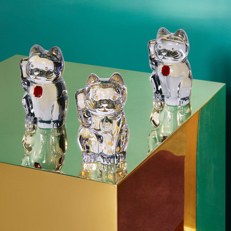 Baccarat Crystal Figurines Inspired by Japanese Good Luck Charms, Maneki Neko and Daruma